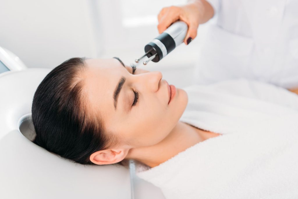attractive-woman-getting-facial-microcurrent-thera-2024-11-19-07-48-26-utc