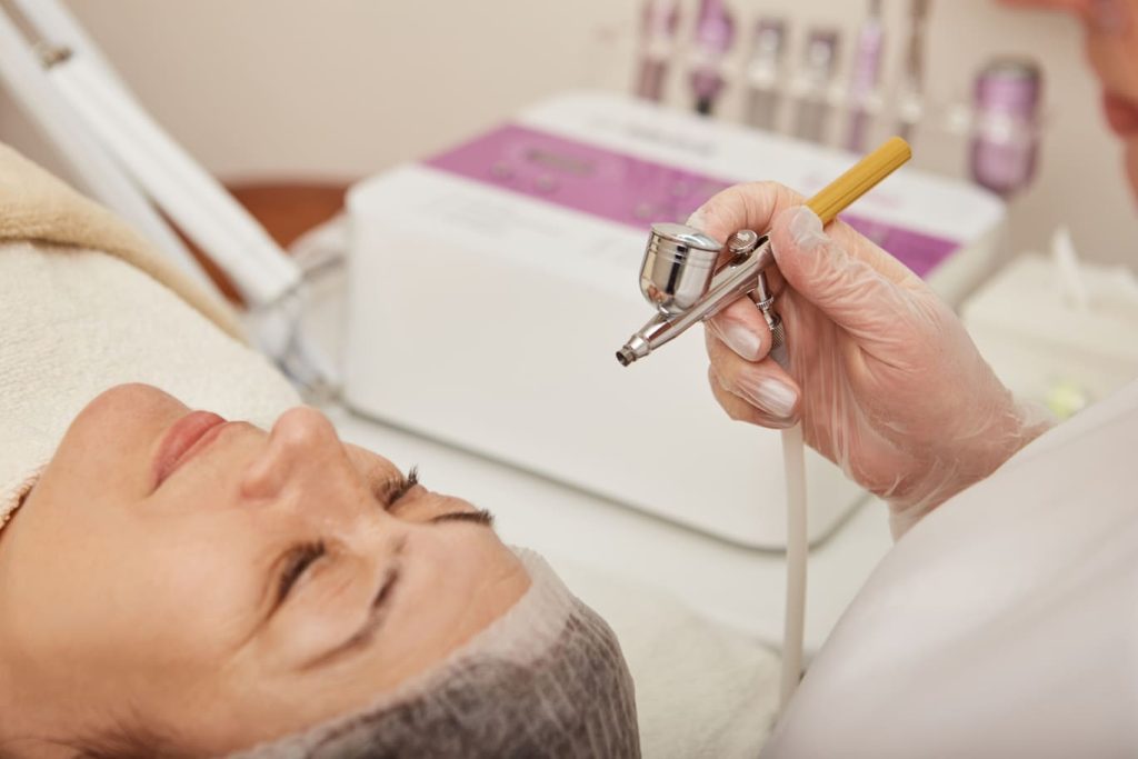 lovely-woman-receiving-facial-treatment-at-wellnes-2025-03-24-09-37-28-utc